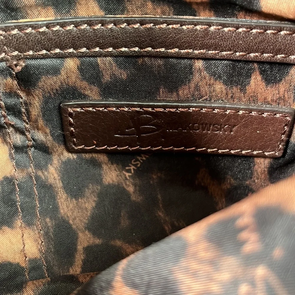 B. Makowski Braided Leather Crossbody Bag